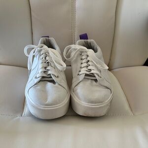 White Sneakers with Purple Accent